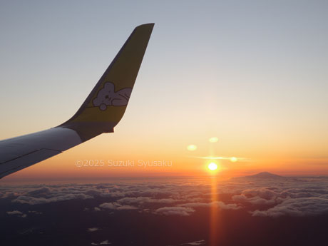 機窓の夕陽